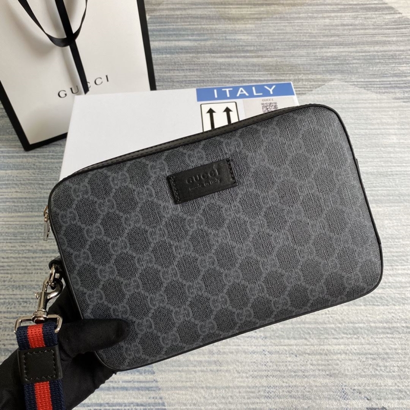 G*u*i clutch bags